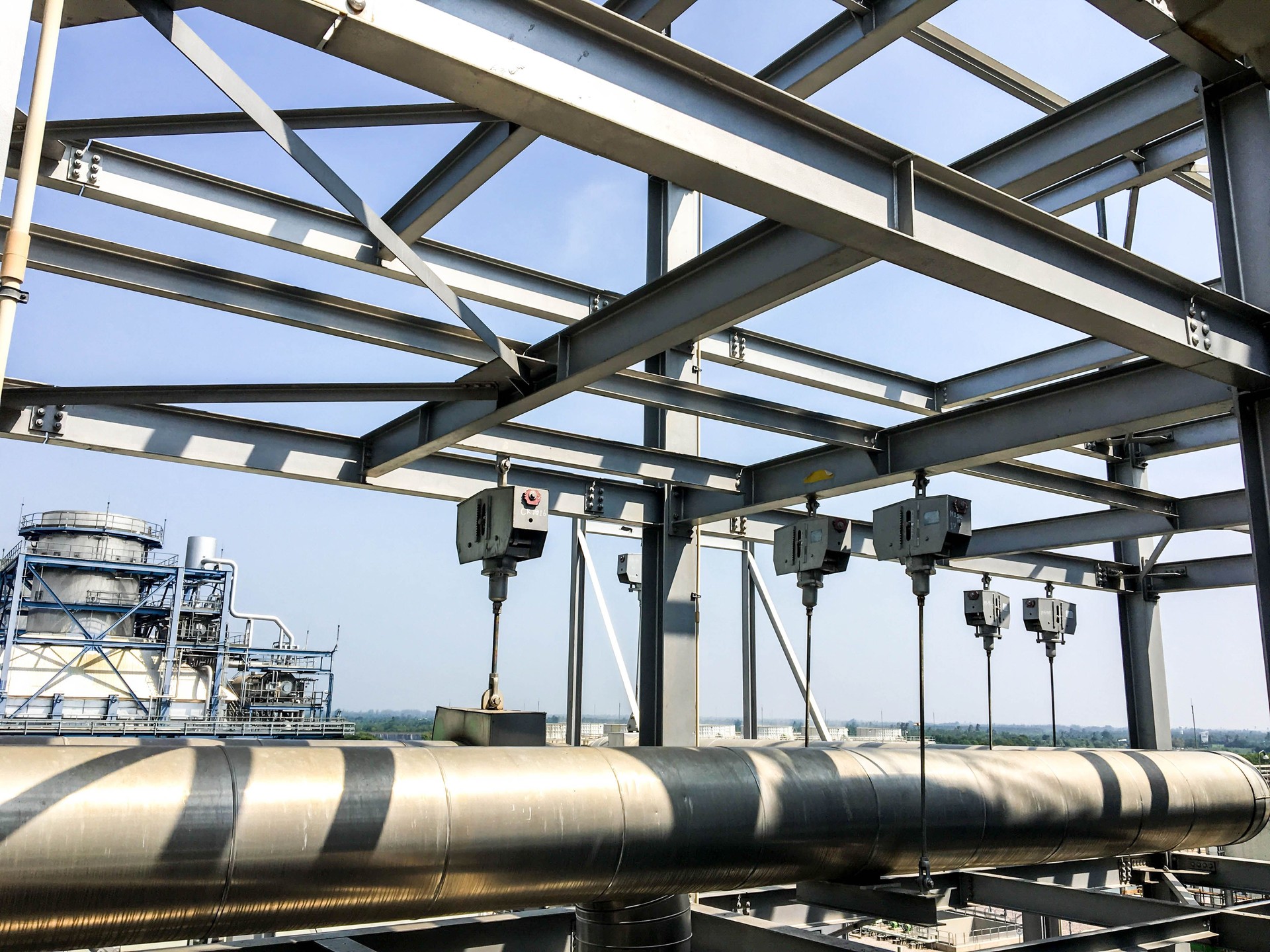 Spring hanger pipe support in power plant.