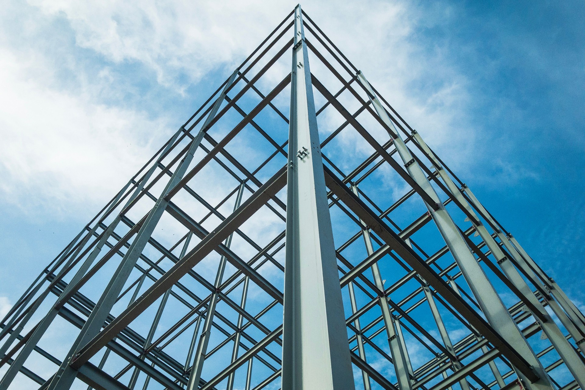 Structure of steel for building construction on sky background.